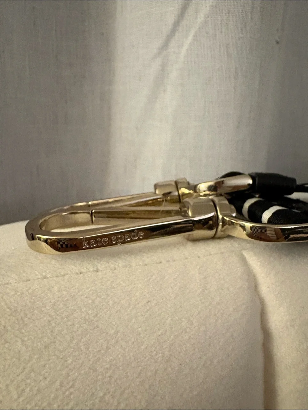 kate spade Gold-Tone Key Ring with Black & White Stripe Strap